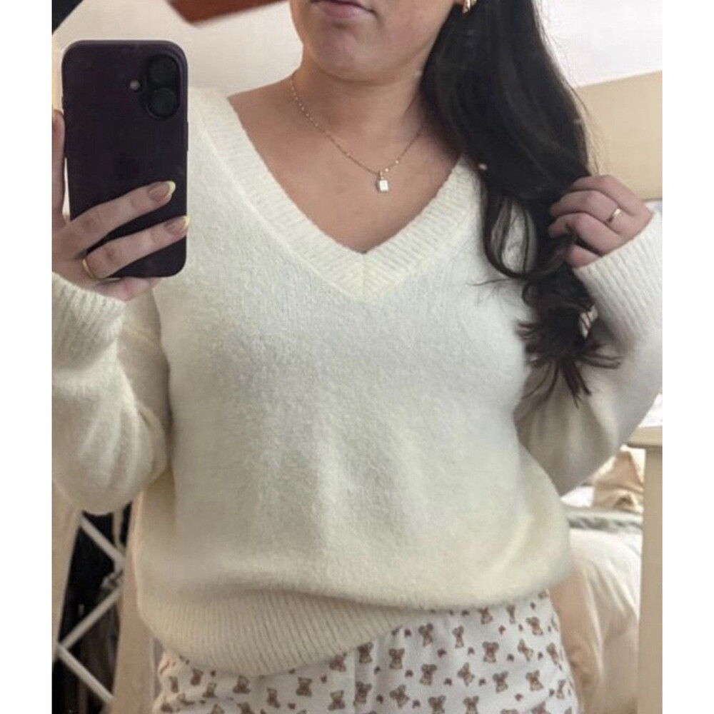 Jessica Simpson cream sweater with open back detail, size small/medium